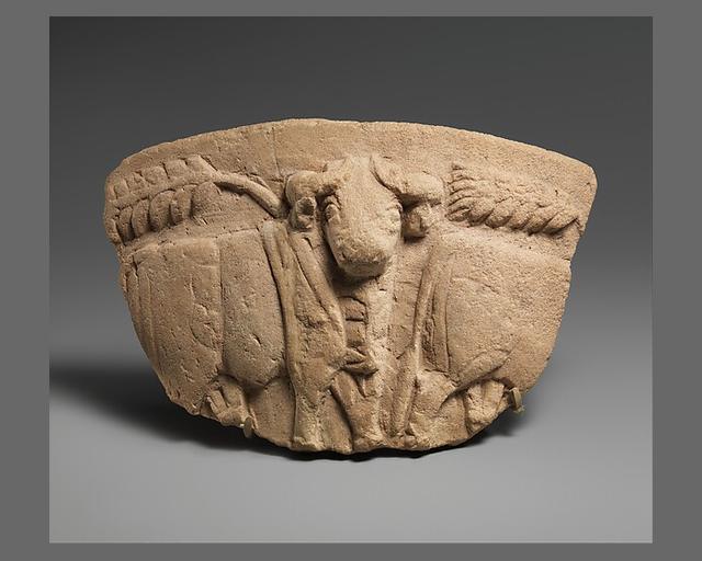 Fragment of a vessel with wheat stalks and a procession of bulls in relief