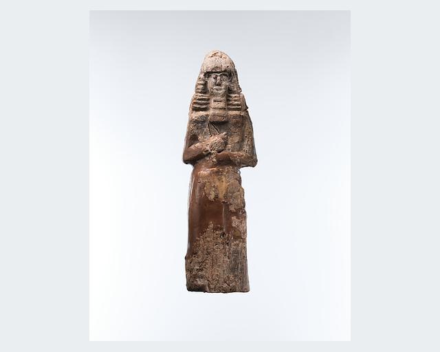 Bearded warrior holding a spear