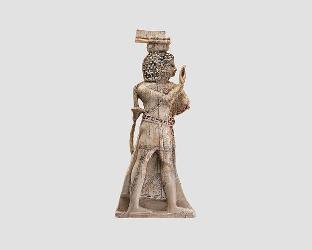 Openwork furniture plaque with a male youth
