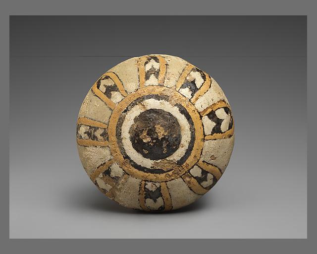 Knob with an eight-petaled rosette
