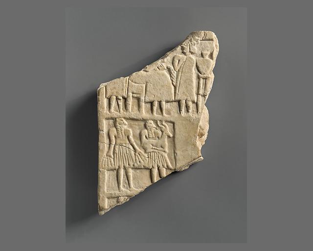 Plaque with a banquet scene