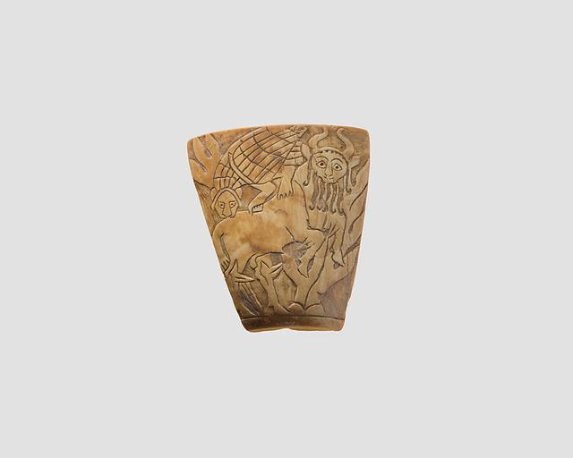 Inlay: combat between a human-headed bull and a lion-headed eagle