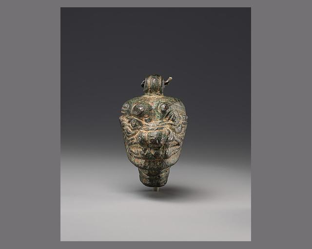 Pendant with the head of Pazuzu